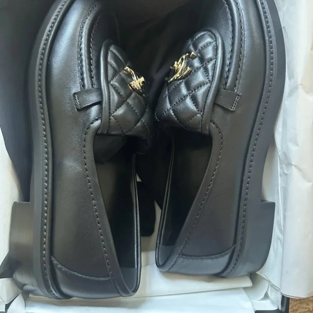 CHANEL Black Quilted Loafers with Gold Accents - Picture 4 of 5